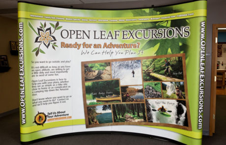 Open leaf excursions trade show display