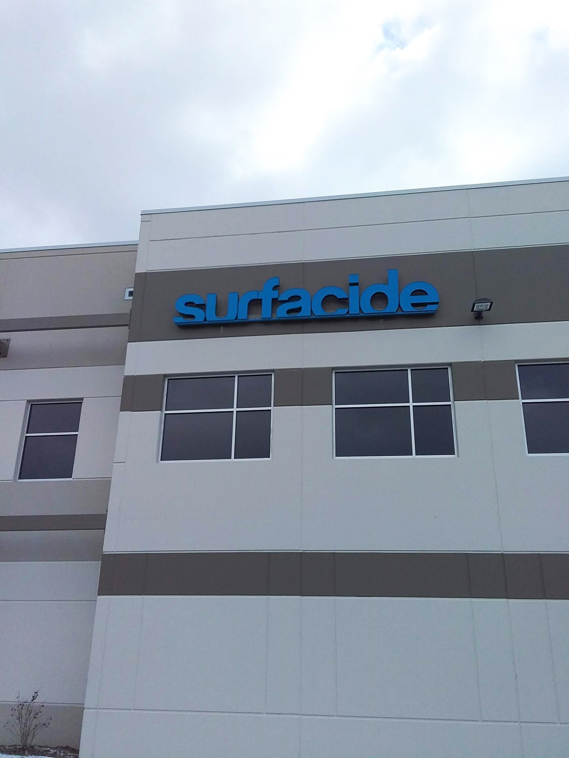 surfacide sign on building
