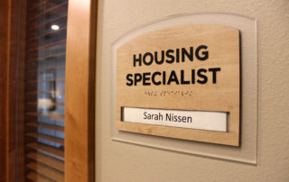 housing specialist door sign
