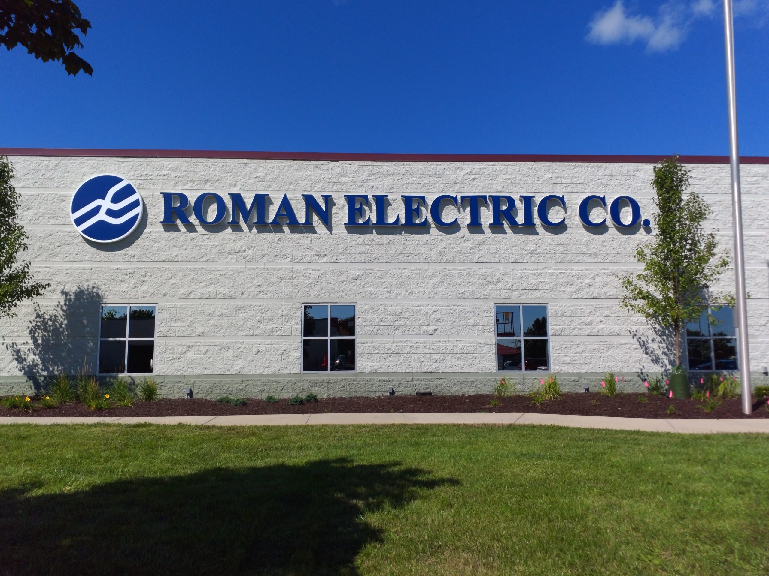 roman electric building sign lettering