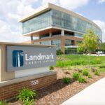 An image of a monument sign in front of the Landmark Credit Union headquarters.