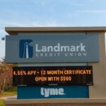 Image is of a monument sign for Landmark Credit Union that includes an Electronic Message Center (EMC) sign.
