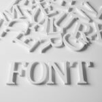 White letters on a white background spelling "FONT"